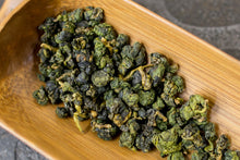 将图片加载到图库查看器,天池梨山茶